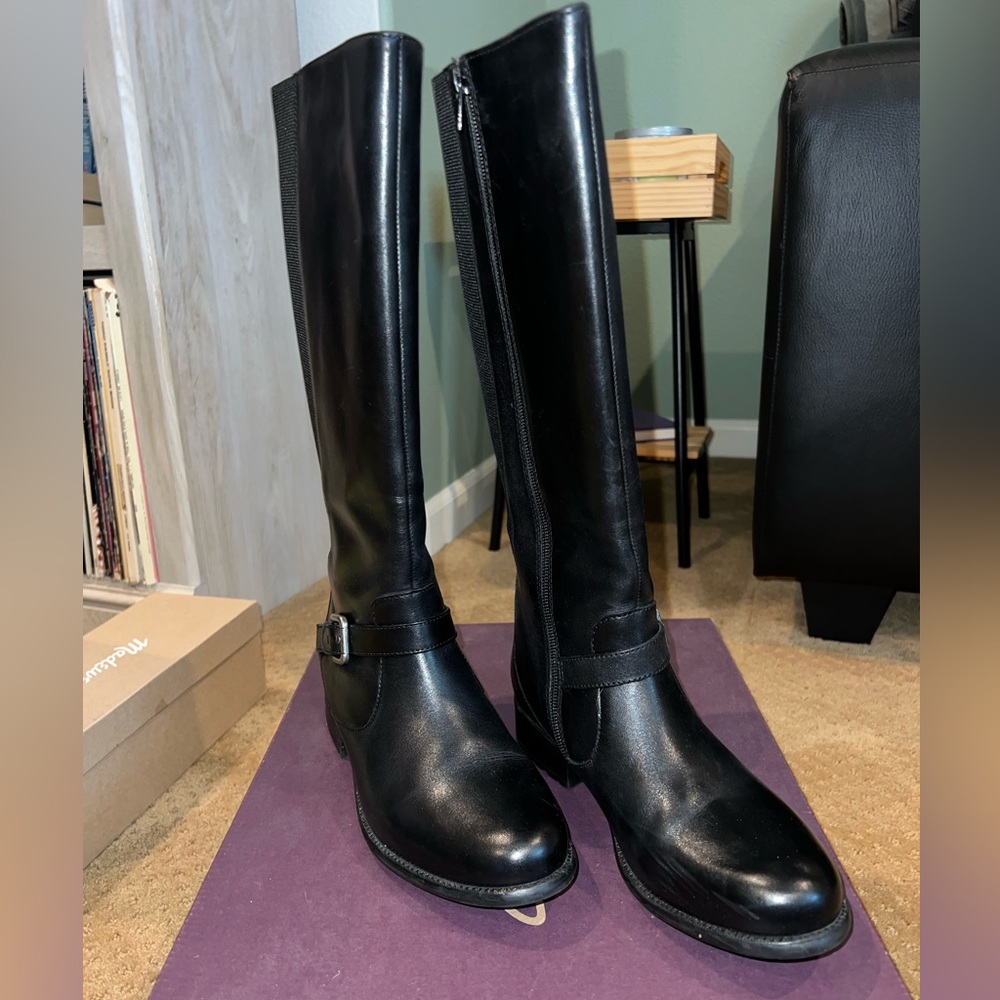 Women’s black boots. Clark’s. Size 8. Worn once. No wear or tear.